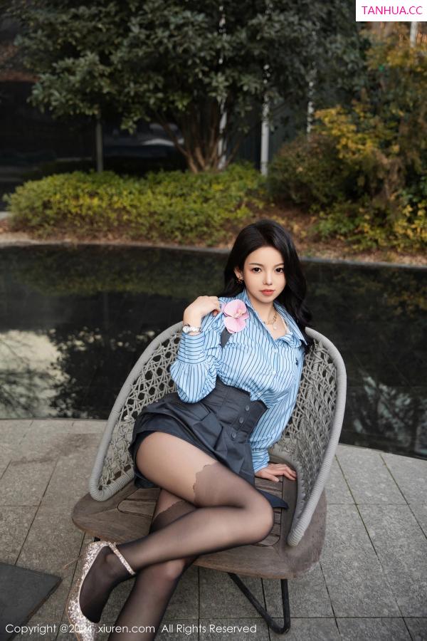   [XiuRen]高清写真图 2024.01.18 No.7979 大美妞儿 短裙黑丝第5张图片